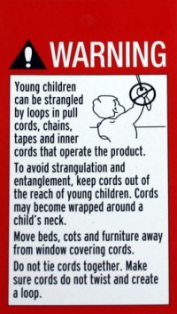 Self-adhesive chain warning sign for Roman blinds etc.