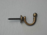 Medium antique finish brass ball-end tie-back hook 