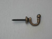 Small antique finish brass ball-end tie-back hook 